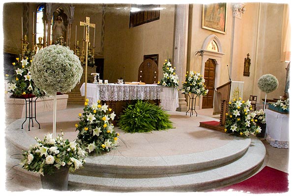 white wedding floral arrangements. church-floral-arrangements-in-