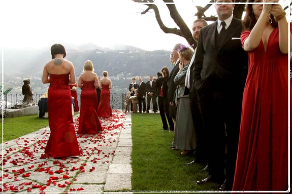 rose-petals-wedding. Red were centerpieces for the reception to Hotel San 