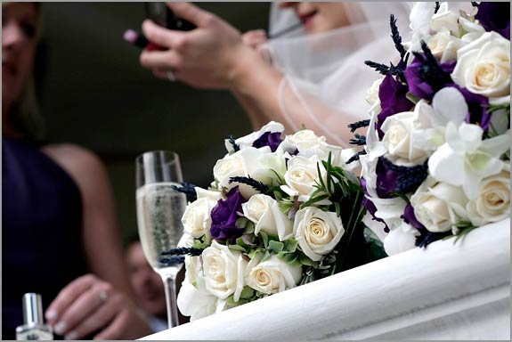 It perfectly matched wedding color theme with is tie and purple details