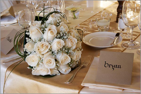 ivorygoldbridalbouquet The arrangements of the tables were surely a 