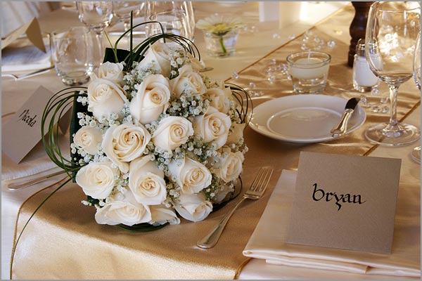 ivorygoldbridalbouquet The arrangements of the tables were surely a