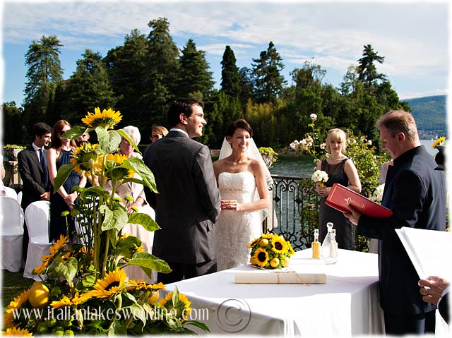 Their wedding was characterised by a limpid blue lake a light breeze that