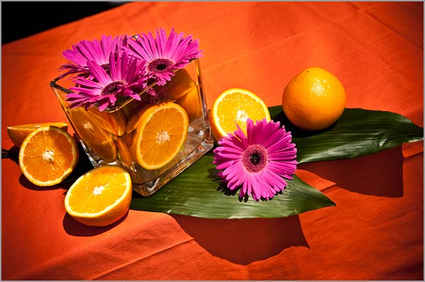 orangefuchsiaweddingcenterpieces For the table of the ceremony we opted 