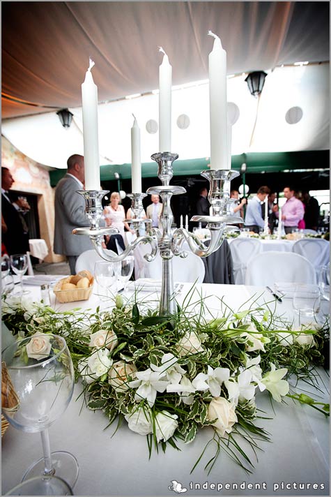 centerpieces with candelabras and flowers