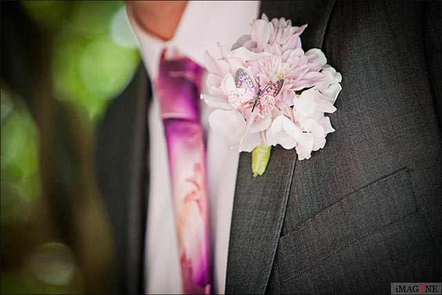 wedding buttonholes with peonies and butterflies