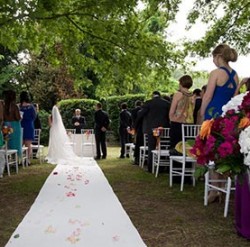 Orange and fuchsia wedding at Scuderie Odescalchi in Bracciano