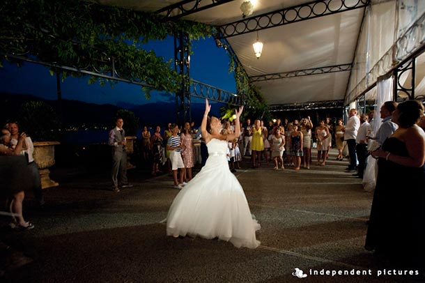  Caroline and Tony's wedding - July 2012 Throwing of the bouquet in the pavilion after the cutting of the wedding cake. And dances to follow. - Photo by Independent Pictures.