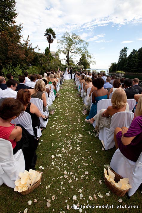  Laura and Craig's wedding - September 2011 Another perspective of wonderful protestant blessing in the garden by the shores. Aisle with petals and wonderful setting - photo by Independent Pictures