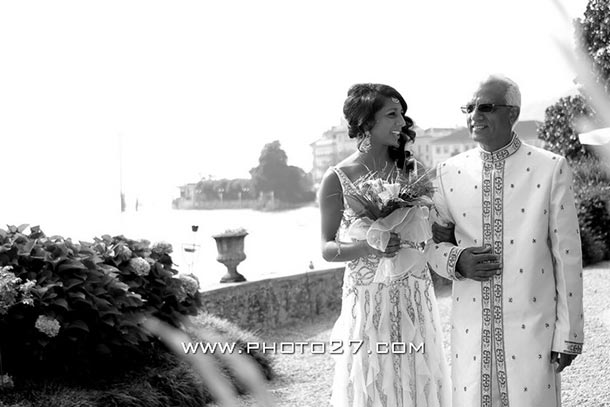   Rani and Edward's wedding - July 2010 An ethnic wedding at Villa Rusconi. Rani's Indian wedding, here she comes with her dad reaching the aisle. Photo by Photo27