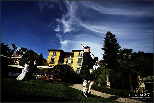 Fiona and Marco's wedding - May 2010 One of my favorite picture. Bag piper lead bride and groom to the reception...it is Fiona's dad our Scottish lovely bride! Photo by Photo27