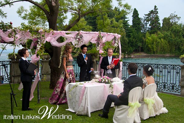 Lina and Borja's wedding - July 2010 Ceremony Gazebo arrangement with pink organza and flowers Photo by Italian Lakes Wedding