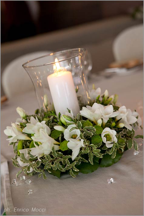 wedding centerpiece with candles by Stresa florist