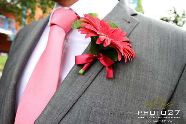 red gerberas buttonhole by La Piccola Selva florist in Orta Lake