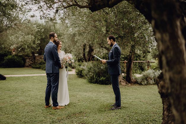 ceremony under olive trees on Lake Garda