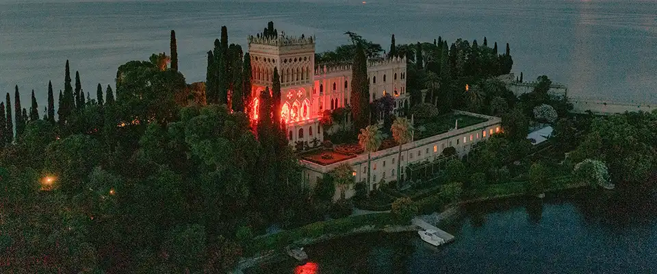 Isola del Garda and Villa Borghese Cavazza illuminated at night